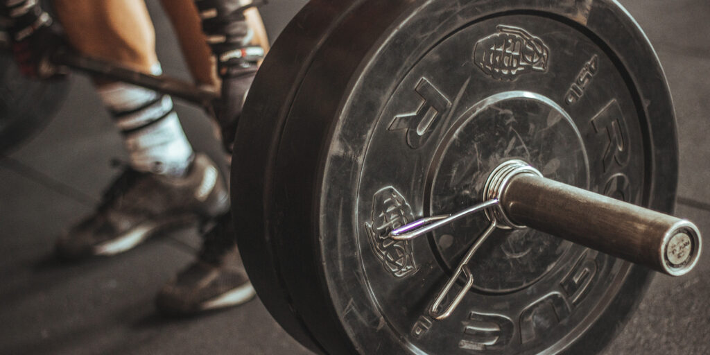 lifting a heavy barbell